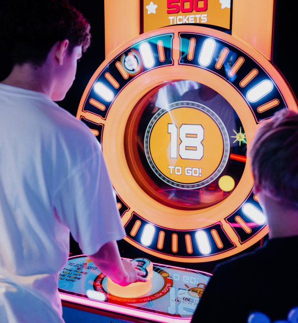 Kids playing ticket arcade games at Play It Southbank Melbourne